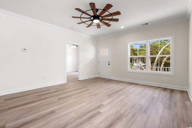 1712 26th Ave N, North Myrtle Beach, SC 29582 - unfurnished living room with ceiling fan, light wood finished floors, crown molding, and recessed lighting