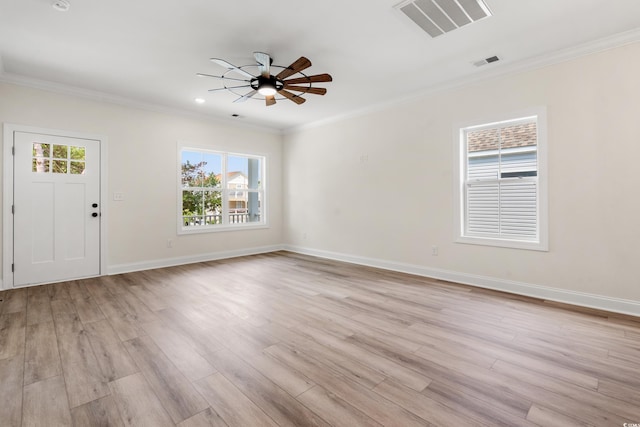 1712 26th Ave N, North Myrtle Beach, SC 29582 - foyer entrance with plenty of natural light, ceiling fan, light wood-style floors, crown molding, and recessed lighting