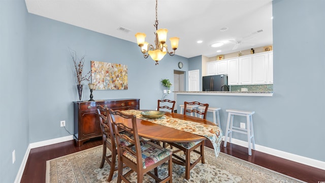173 Knight Cir Unit 1, Pawleys Island, SC 29585 - dining area featuring dark wood-style floors, a chandelier, recessed lighting, and ceiling fan