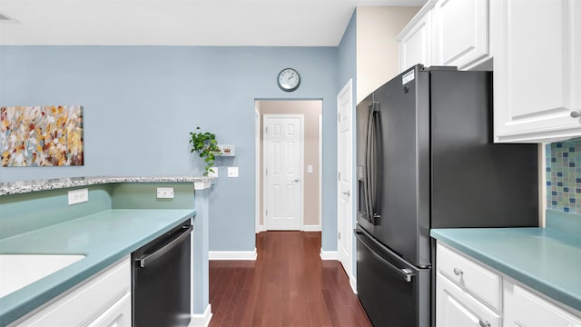 173 Knight Cir Unit 1, Pawleys Island, SC 29585 - kitchen with stainless steel appliances, dark wood-style floors, white cabinets, and light countertops
