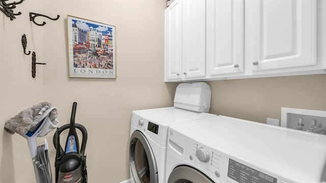 173 Knight Cir Unit 1, Pawleys Island, SC 29585 - laundry area with washing machine and clothes dryer and cabinet space