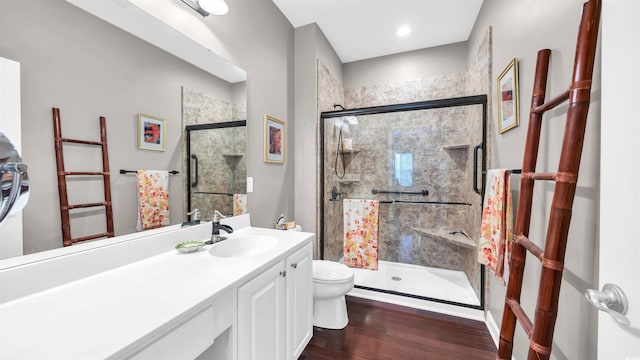 173 Knight Cir Unit 1, Pawleys Island, SC 29585 - bathroom with a shower stall, vanity, and wood finished floors