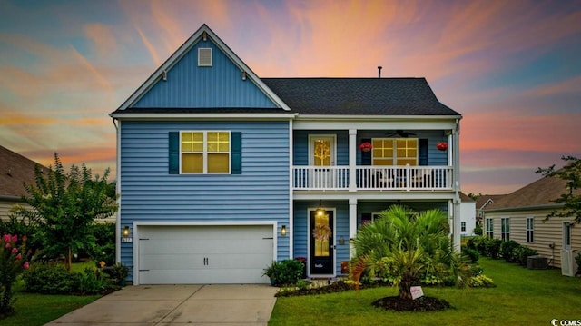 617 Carolina Farms Blvd, Myrtle Beach, SC 29579 - view of front of property featuring a yard, board and batten siding, concrete driveway, and a balcony