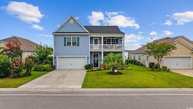 617 Carolina Farms Blvd, Myrtle Beach, SC 29579 - traditional home with a balcony, driveway, a front lawn, board and batten siding, and an attached garage