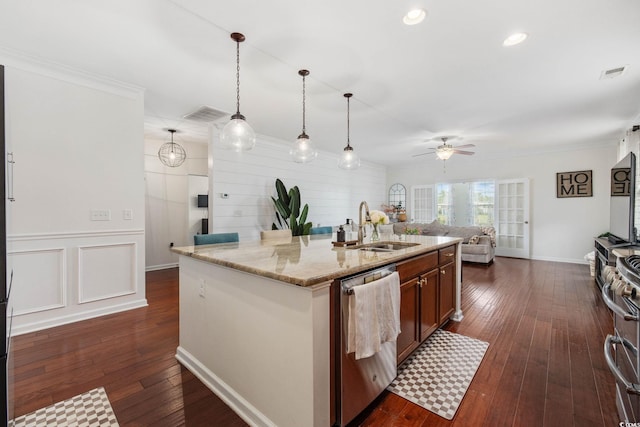 617 Carolina Farms Blvd, Myrtle Beach, SC 29579 - kitchen featuring appliances with stainless steel finishes, ceiling fan, a kitchen island with sink, dark wood-type flooring, and ornamental molding