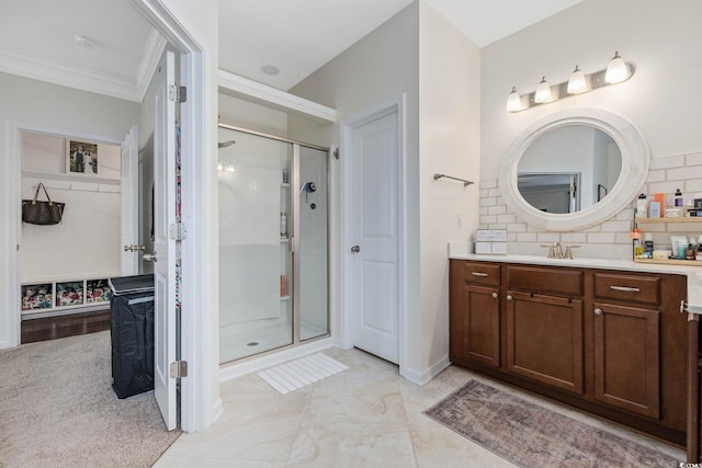 617 Carolina Farms Blvd, Myrtle Beach, SC 29579 - bathroom with a stall shower, vanity, backsplash, ornamental molding, and a walk in closet