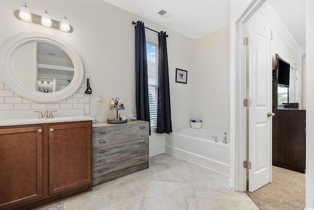 617 Carolina Farms Blvd, Myrtle Beach, SC 29579 - bathroom featuring vanity, tasteful backsplash, and a garden tub