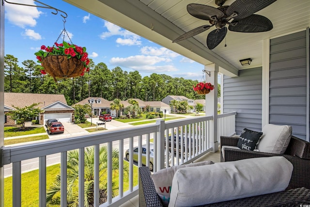 617 Carolina Farms Blvd, Myrtle Beach, SC 29579 - porch with a residential view, a ceiling fan, and view of wooded area