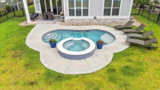 206 Palmetto Harbour Dr, North Myrtle Beach, SC 29582 - view of swimming pool featuring a pool with connected hot tub, a fenced backyard, a patio area, and an outdoor living space