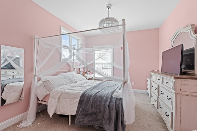 206 Palmetto Harbour Dr, North Myrtle Beach, SC 29582 - bedroom featuring light colored carpet and a chandelier