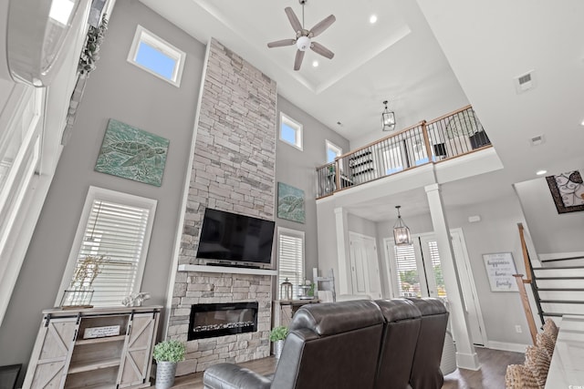 206 Palmetto Harbour Dr, North Myrtle Beach, SC 29582 - living room featuring a ceiling fan, a high ceiling, plenty of natural light, wood finished floors, and recessed lighting