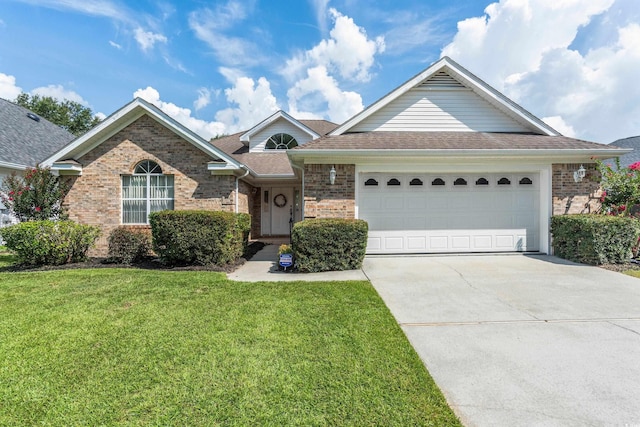 2443 Glen Dr, Little River, SC 29566 - single story home featuring brick siding, a front lawn, driveway, an attached garage, and roof with shingles