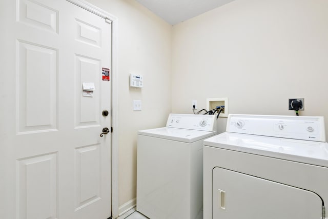 2443 Glen Dr, Little River, SC 29566 - laundry room featuring washing machine and clothes dryer
