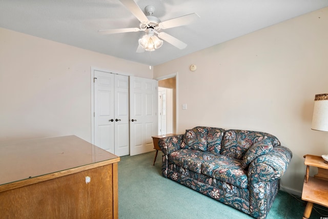 2443 Glen Dr, Little River, SC 29566 - living area with carpet and a ceiling fan
