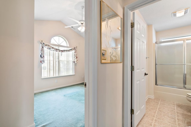 2443 Glen Dr, Little River, SC 29566 - hallway with vaulted ceiling and baseboards