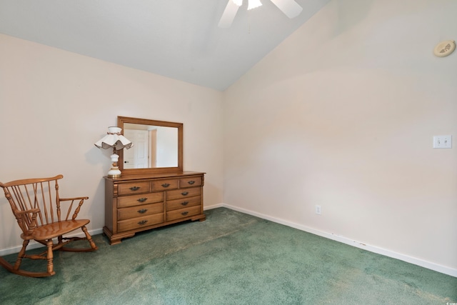 2443 Glen Dr, Little River, SC 29566 - living area featuring dark colored carpet, vaulted ceiling, and a ceiling fan