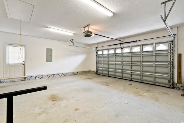 2443 Glen Dr, Little River, SC 29566 - garage featuring a garage door opener and electric panel