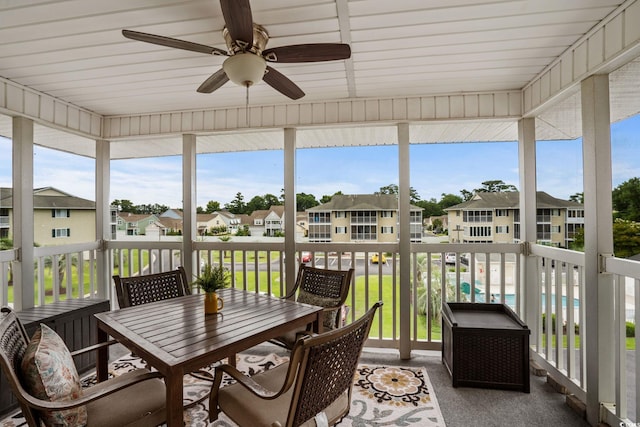 202 Landing Rd Unit 202H, North Myrtle Beach, SC 29582 - sunroom / solarium with a residential view, a ceiling fan, and outdoor dining space