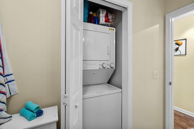 202 Landing Rd Unit 202H, North Myrtle Beach, SC 29582 - laundry area featuring stacked washer / drying machine and wood finished floors