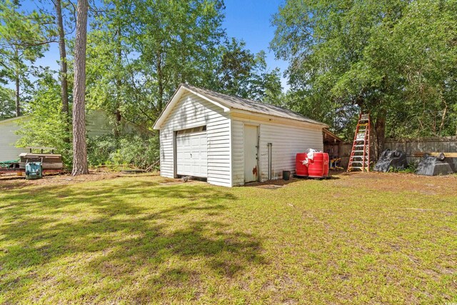 315 N River Pines Rd, Mullins, SC 29574 - view of yard with a detached garage and an outbuilding
