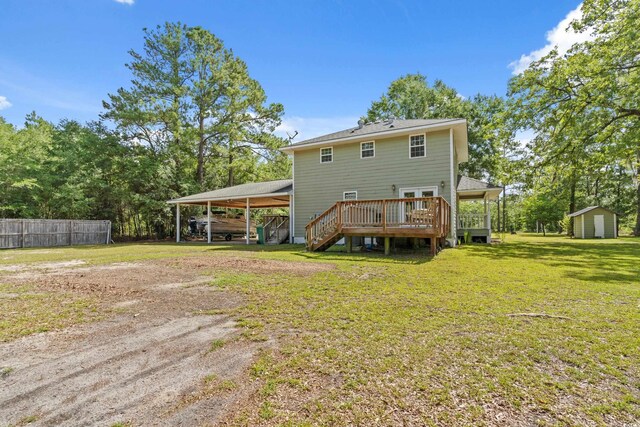 315 N River Pines Rd, Mullins, SC 29574 - back of house with a shed, dirt driveway, a detached carport, a deck, and stairway