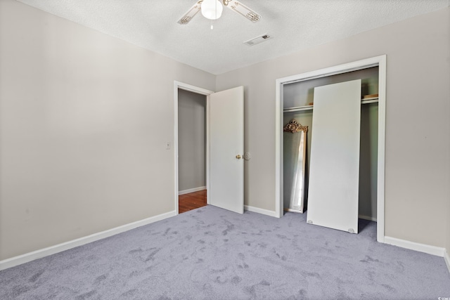 315 N River Pines Rd, Mullins, SC 29574 - unfurnished bedroom with carpet, a textured ceiling, a ceiling fan, and a closet