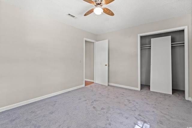 315 N River Pines Rd, Mullins, SC 29574 - unfurnished bedroom featuring carpet floors, a textured ceiling, ceiling fan, and a closet