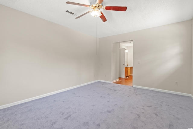 315 N River Pines Rd, Mullins, SC 29574 - spare room featuring a ceiling fan, carpet flooring, and a textured ceiling
