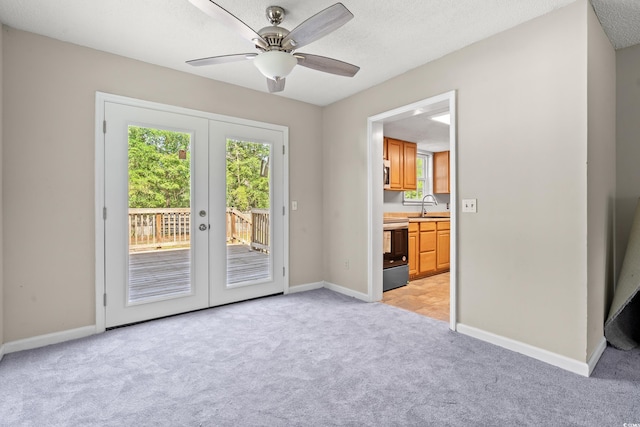 315 N River Pines Rd, Mullins, SC 29574 - unfurnished room featuring light carpet, a ceiling fan, and french doors