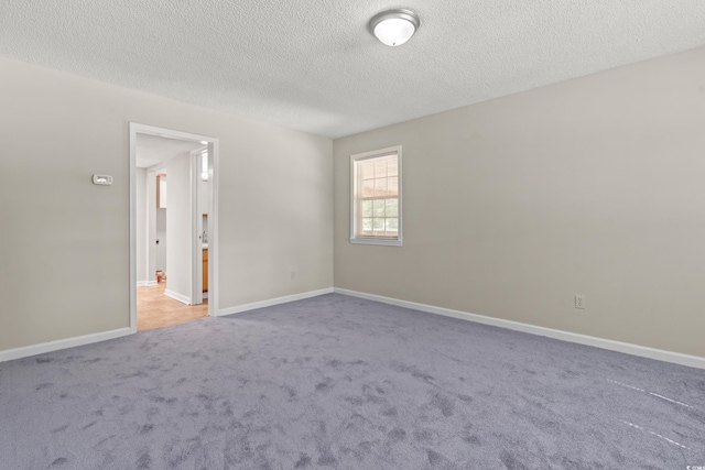 315 N River Pines Rd, Mullins, SC 29574 - carpeted empty room featuring a textured ceiling and baseboards