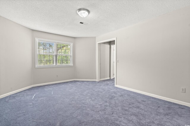 315 N River Pines Rd, Mullins, SC 29574 - carpeted spare room featuring a textured ceiling and baseboards