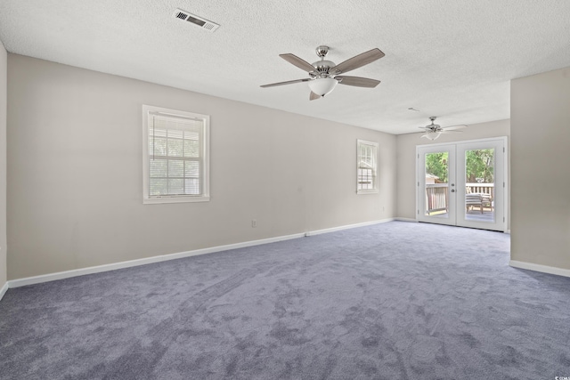 315 N River Pines Rd, Mullins, SC 29574 - carpeted spare room with ceiling fan, a textured ceiling, and french doors