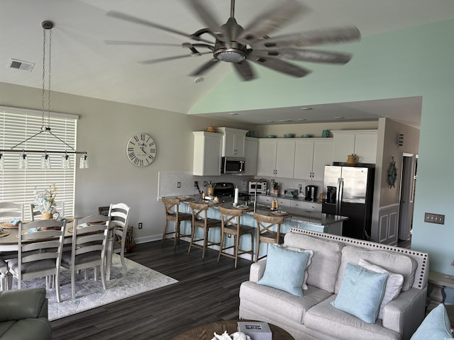240 Sundew Loop, Little River, SC 29566 - living room with dark wood-type flooring, a ceiling fan, and vaulted ceiling