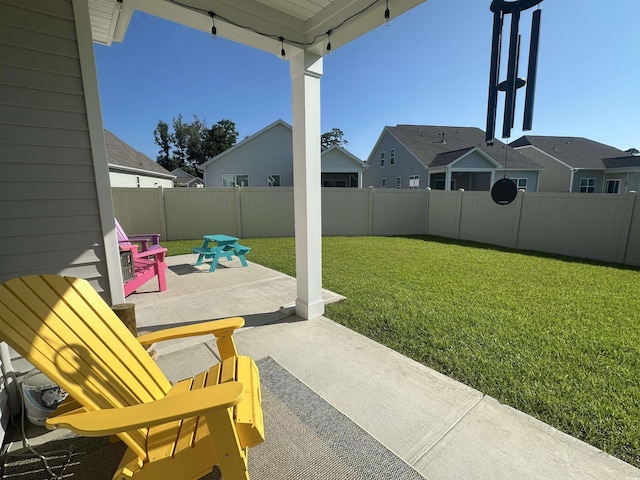 240 Sundew Loop, Little River, SC 29566 - fenced backyard with a patio and a residential view
