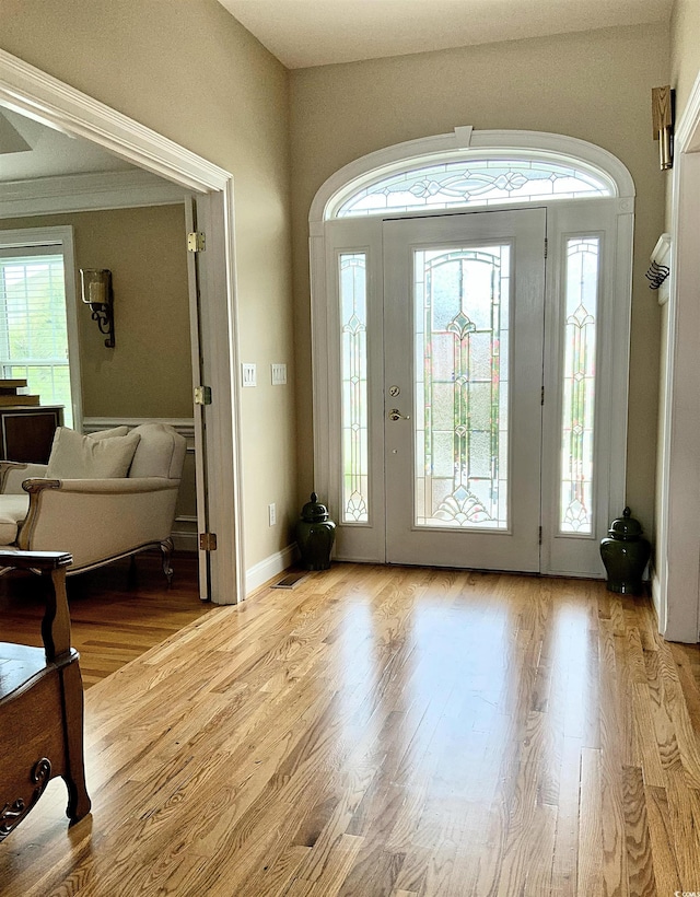 1605 Waterway Dr, North Myrtle Beach, SC 29582 - foyer entrance featuring plenty of natural light and wood finished floors