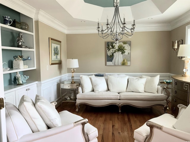 1605 Waterway Dr, North Myrtle Beach, SC 29582 - living room with a chandelier, wood finished floors, a wainscoted wall, and crown molding