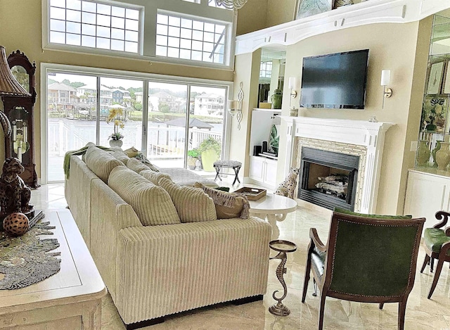 1605 Waterway Dr, North Myrtle Beach, SC 29582 - living room with a fireplace and a towering ceiling