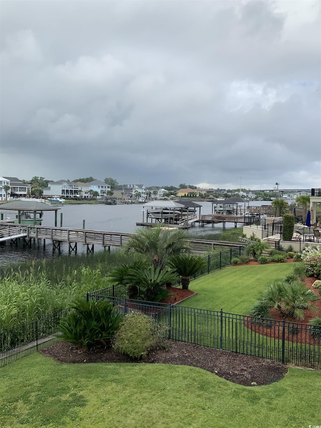 1605 Waterway Dr, North Myrtle Beach, SC 29582 - view of yard with a boat dock and a water view