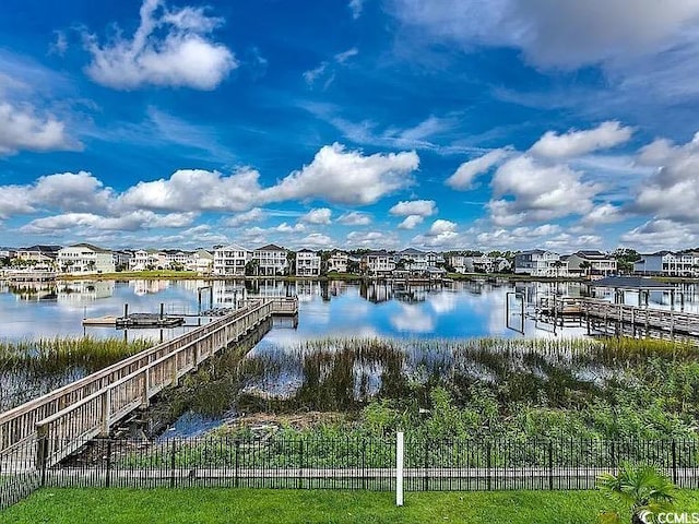1605 Waterway Dr, North Myrtle Beach, SC 29582 - dock area featuring a water view and a residential view