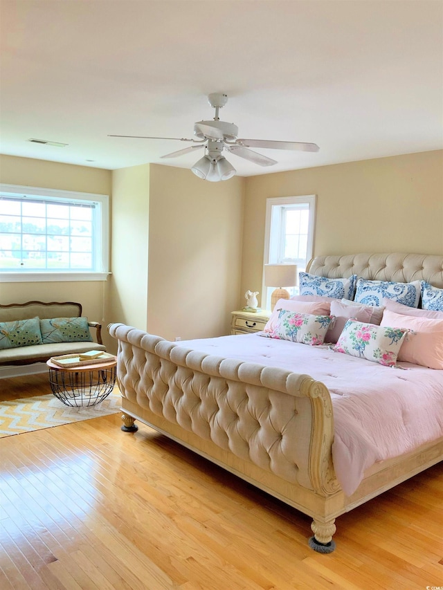 1605 Waterway Dr, North Myrtle Beach, SC 29582 - bedroom with wood finished floors and a ceiling fan