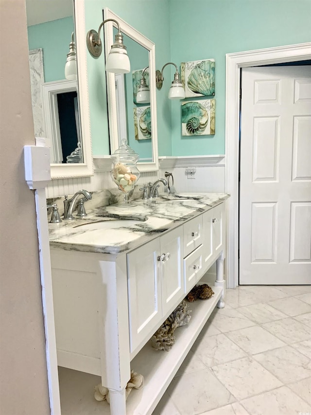 1605 Waterway Dr, North Myrtle Beach, SC 29582 - bathroom with double vanity and marble finish flooring