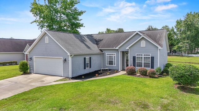 127 Ashworth Dr, Little River, SC 29566 - view of front of house with a garage, driveway, a front yard, and roof with shingles