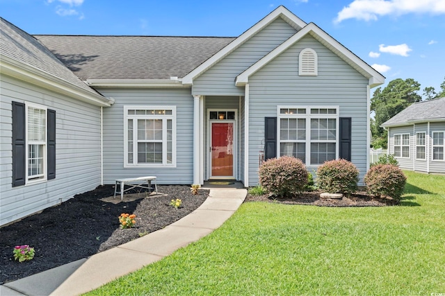 127 Ashworth Dr, Little River, SC 29566 - view of front of property with a front lawn and roof with shingles