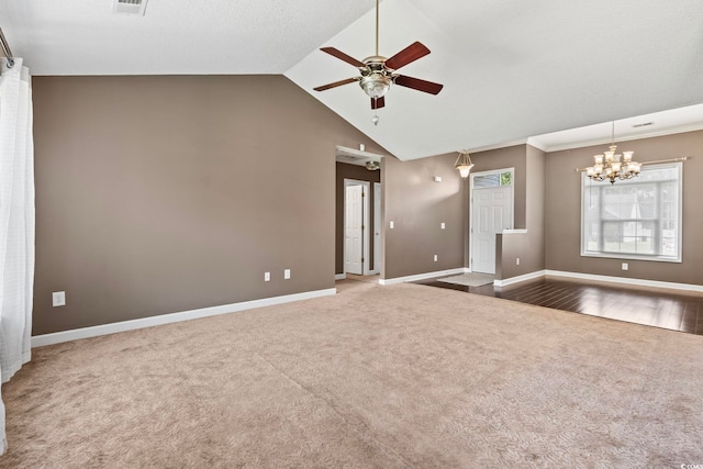 127 Ashworth Dr, Little River, SC 29566 - unfurnished living room with carpet floors, ceiling fan, a chandelier, and lofted ceiling