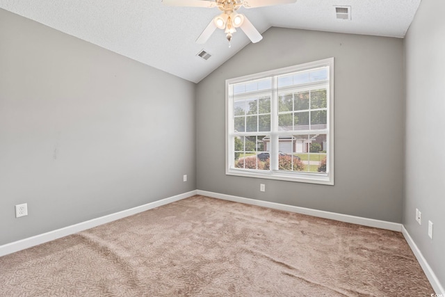 127 Ashworth Dr, Little River, SC 29566 - spare room with a ceiling fan, carpet flooring, lofted ceiling, and a textured ceiling