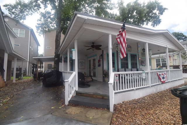 6001-5723 Kings Hwy, Myrtle Beach, SC 29575 - view of front facade featuring ceiling fan, covered porch, and french doors