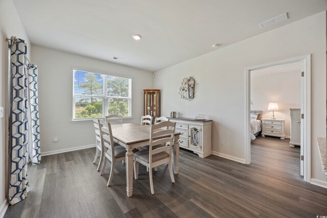 305 Picnic Basket Pl, Longs, SC 29568 - dining room with dark wood-type flooring and baseboards