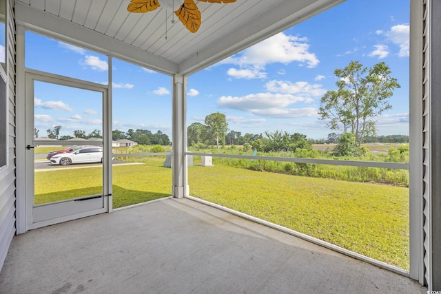 305 Picnic Basket Pl, Longs, SC 29568 - unfurnished sunroom with a ceiling fan