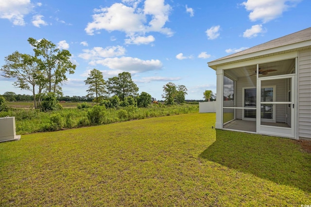 305 Picnic Basket Pl, Longs, SC 29568 - view of grassy yard with a sunroom and ceiling fan