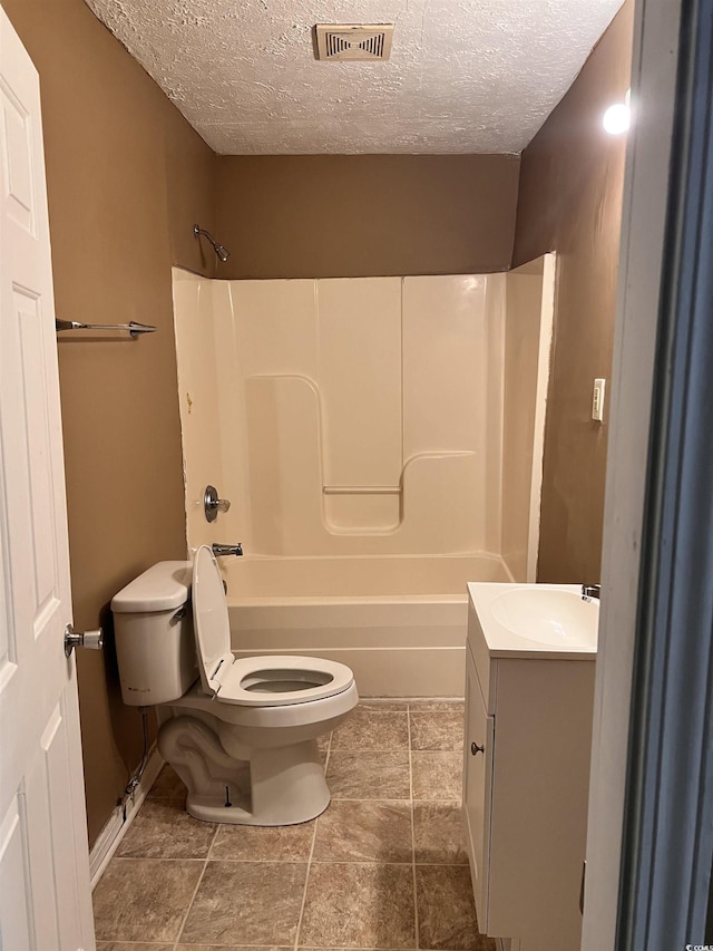 1706 Foster St, Conway, SC 29527 - bathroom featuring a textured ceiling, bathtub / shower combination, and vanity